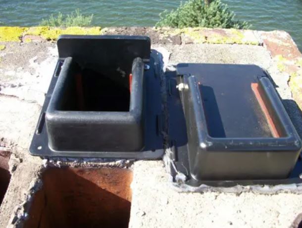 Image of a Chimney Being Cleaned Out