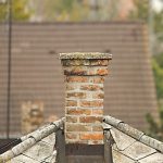 Old chimney in need of crown repairs